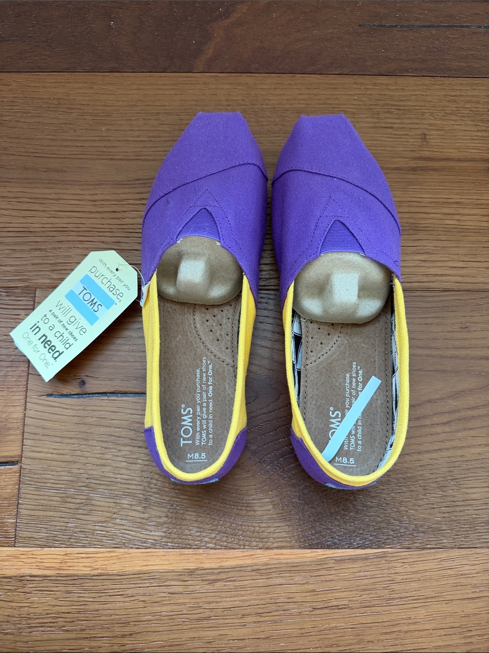 TOMS Women's Purple Canvas Slip-Ons with Yellow Trim